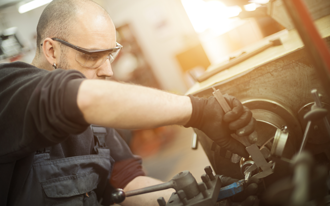 Machinist Working on Lathe